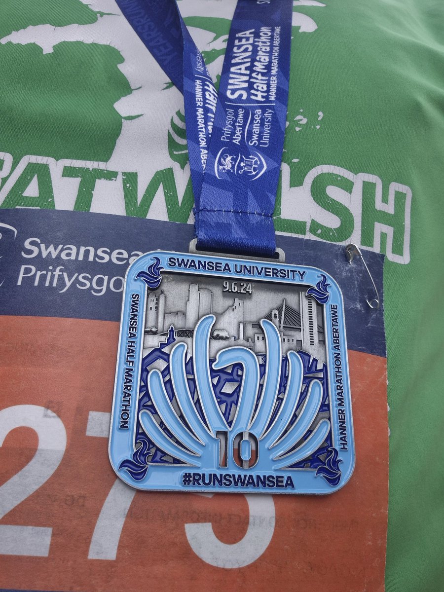 rhysged's tweet photo. Very tired but I did it. Finished the Swansea Half Marathon in 2 hrs 4 mins 54 secs. Time for a pizza and a pint. https://t.co/iPq3ZlPbid