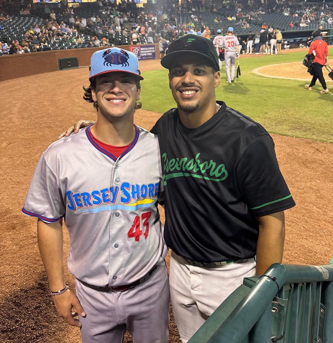 MPFriarBaseball's tweet image. Great pic of former Friar teammates Jordan Dissin ‘20 and Lonnie White ‘21 after matching up in minor league action