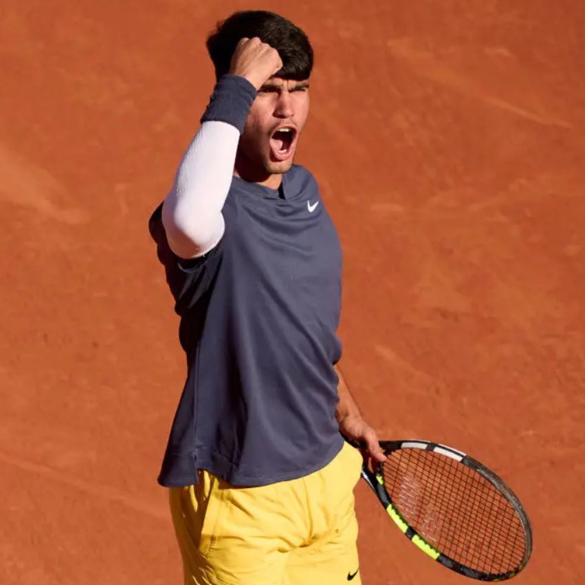 PopBase's tweet photo. Carlos Alcaraz becomes the youngest man in history to win a Grand Slam title on all three surfaces at 21 — after winning Roland-Garros. https://t.co/QM6hazu36A