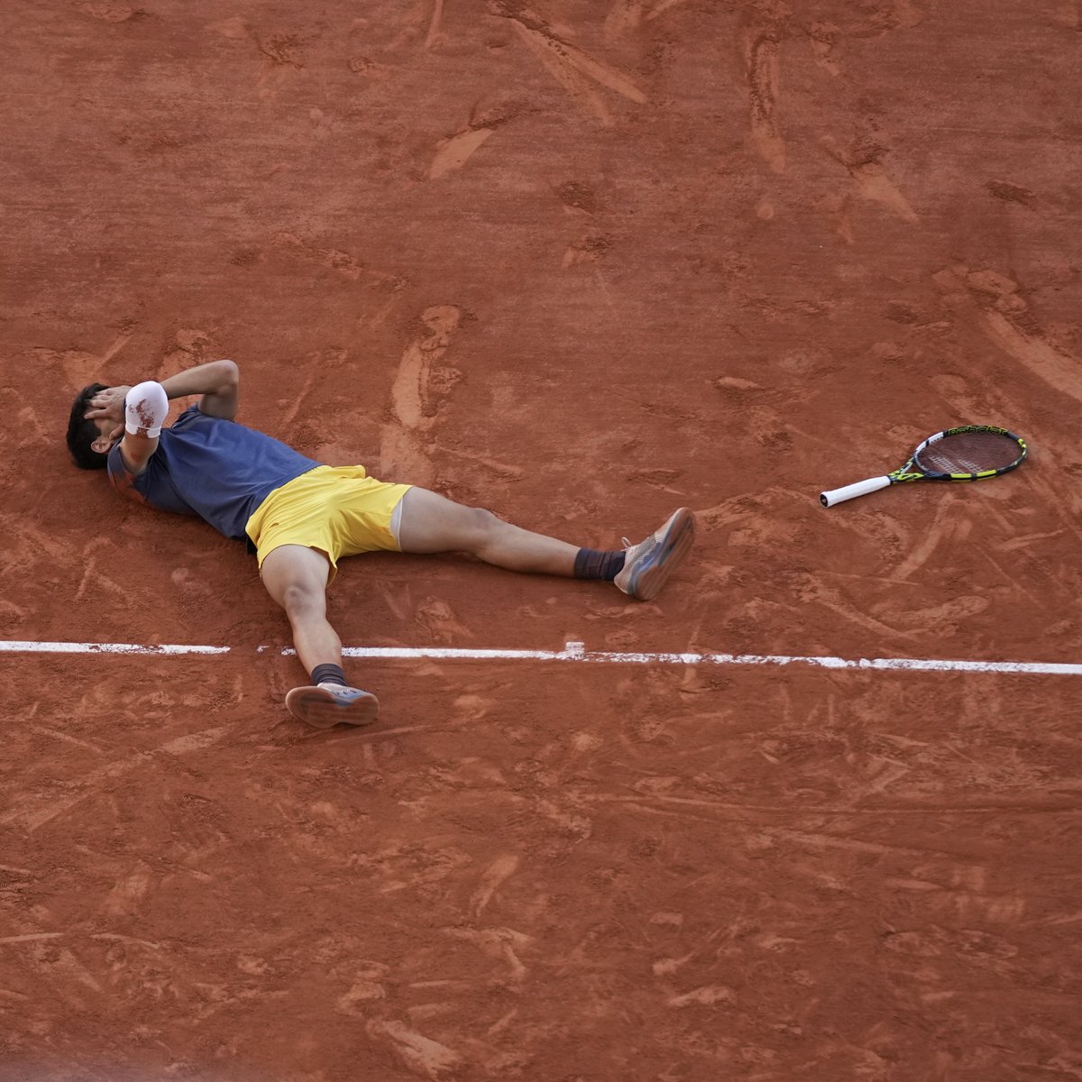 rolandgarros's tweet photo. A first Roland-Garros title. A third Grand Slam title. 21 years old.

How Carlos Alcaraz made history as the youngest player to capture Grand Slam titles on all three surfaces 👇