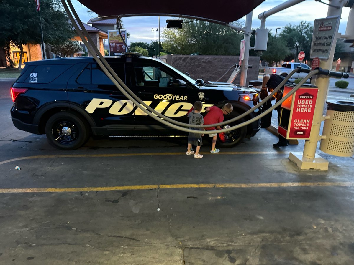 Goodyearpolice's tweet photo. ๐ Big shoutout to Dallas (gray shirt) and Hunter (red shirt) for lending a helping hand to Officer Matthews with cleaning his car this week! Your community spirit and support are truly appreciated. ๐๐
#goodyearpd #CommunityHeroes #TeamWork #SupportLocalPolice https://t.co/ty3fy3N33G