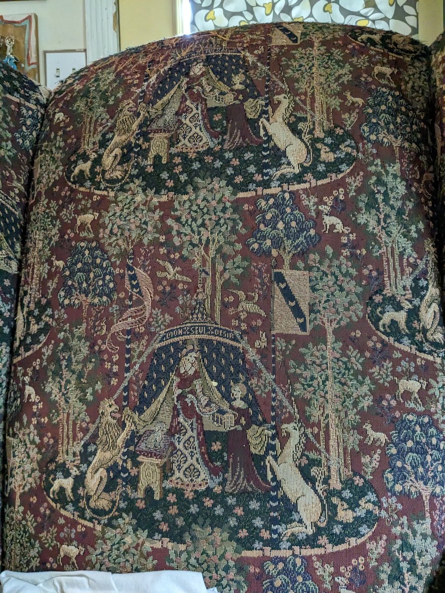 antlerantler's tweet photo. Pls help me twt‼️I bought this chair in 2009 w a WOVEN unicorn tapestry fabric, it's my very fav thing, I'm obsessed w it but the years (and cats) have taken their toll. I can only find printed fabrics featuring this motif but that simply will not do! Help me find this fabric! 🙏🏼 https://t.co/2NS6chYaIy