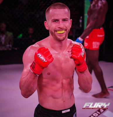MMA__Matchmaker's tweet photo. 🇺🇸Paris Moran (now 11-2) gets the R2 submission to defend his @FuryFightingTX Flyweight title !

He was facing tough 🇺🇸Freddie Rodriguez (now 6-2) in the main event of #FuryFC91 

This *should* lock in a DWCS shot for Paris Moran https://t.co/4yunrq6epb