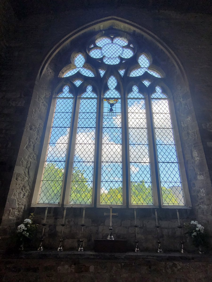AlabasterMiss's tweet image. Lovely #tracery in the chancel, clear glazed apart from this fragment of a  #StainedGlassSunday crucifixion cobbled together.