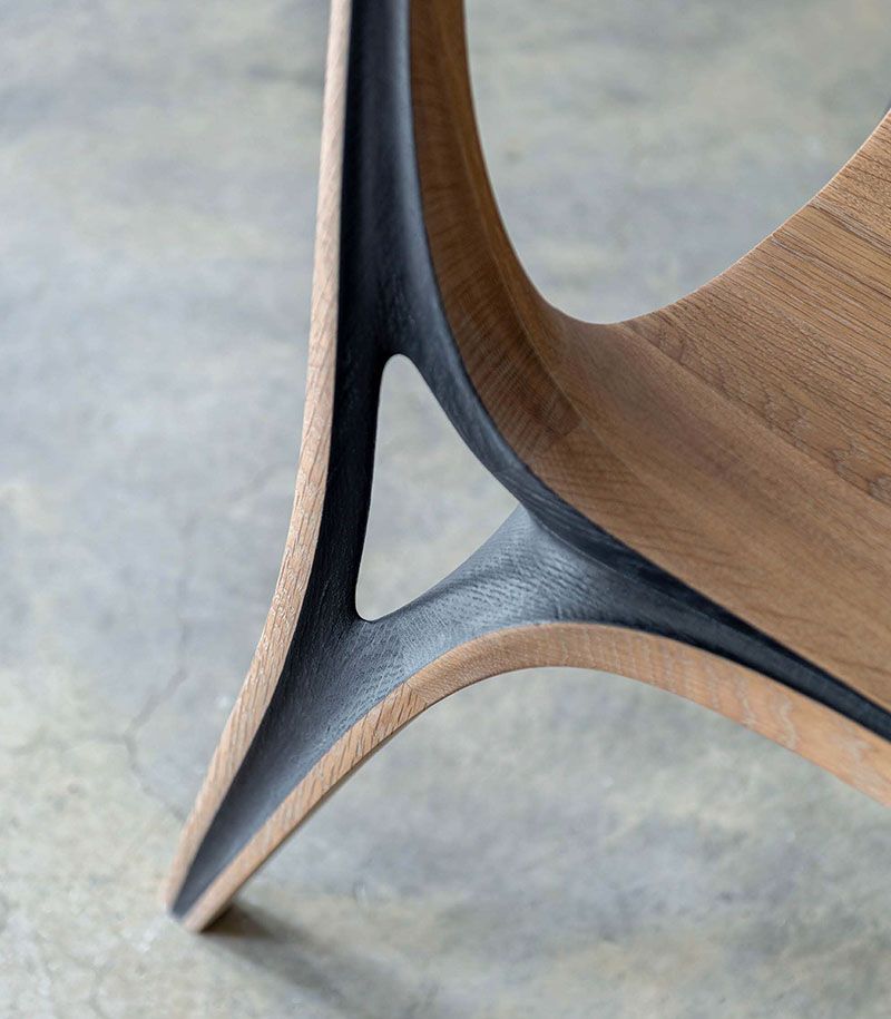 fluid convex and concave shapes take the form of wooden aria chair by <a href="/SASIStudio1/">SASI Studio</a> buff.ly/3VcTYxI
