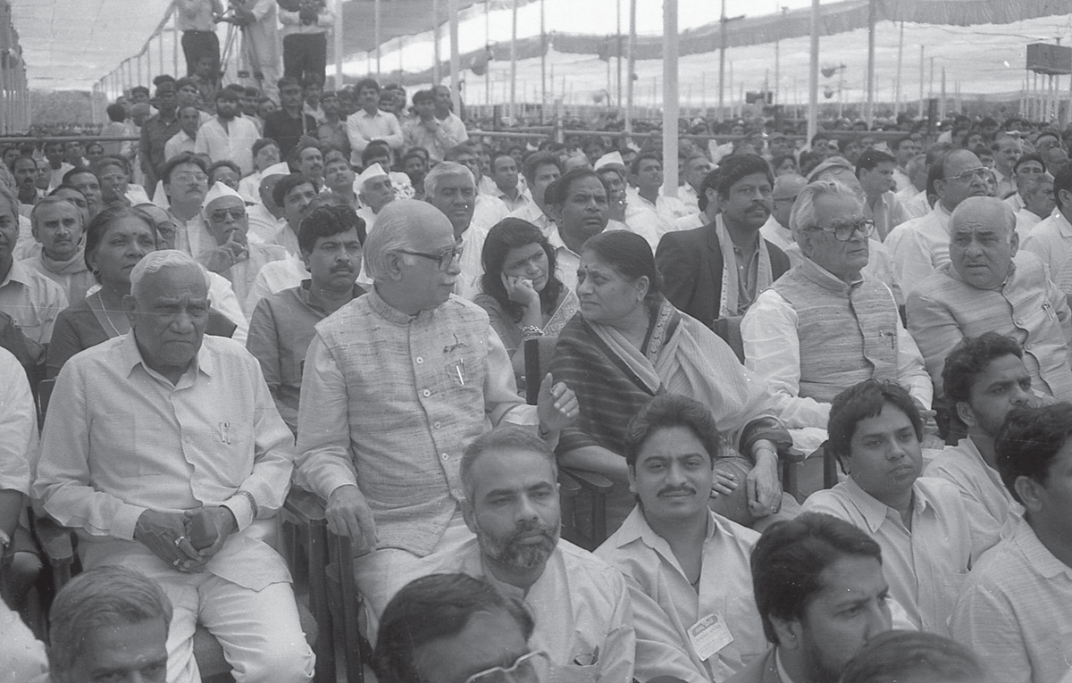 modiarchive's tweet photo. [1995] Narendra Modi sitting on the ground observing the swearing-in ceremony of Keshubhai Patel.

It was the first time the BJP had formed a government with a majority. @narendramodi, serving as the General Secretary (Organisation) of the Gujarat unit at that time, was the key architect behind BJP's victory. Only a decade had passed since he was redirected from the Sangh to the BJP, and his hard work and organisational skills were already evident. He had built the BJP from the ground up in Gujarat.

Perhaps, at that time, he had never even considered contesting elections.

A decade later, he did just that, and with remarkable success! Under his leadership, the BJP emerged as a formidable force—the world's largest political party winning thumping victories election after election. The state of Gujarat, and then the nation of India, became forces to reckon with.

Yesterday, 30 years later, Narendra Modi took the oath as Prime Minister of India for the third time.
