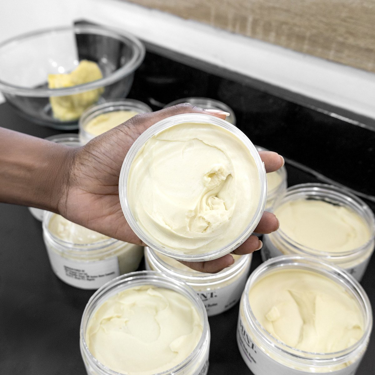 mintedng's tweet photo. Lab this morning smells like a delicious and soothing blend of sandalwood, warmed vanilla and chocolate as we whip up batches of our vanilla sandalwood body butters😋🍦🌰. https://t.co/p4WYRfv9Ac