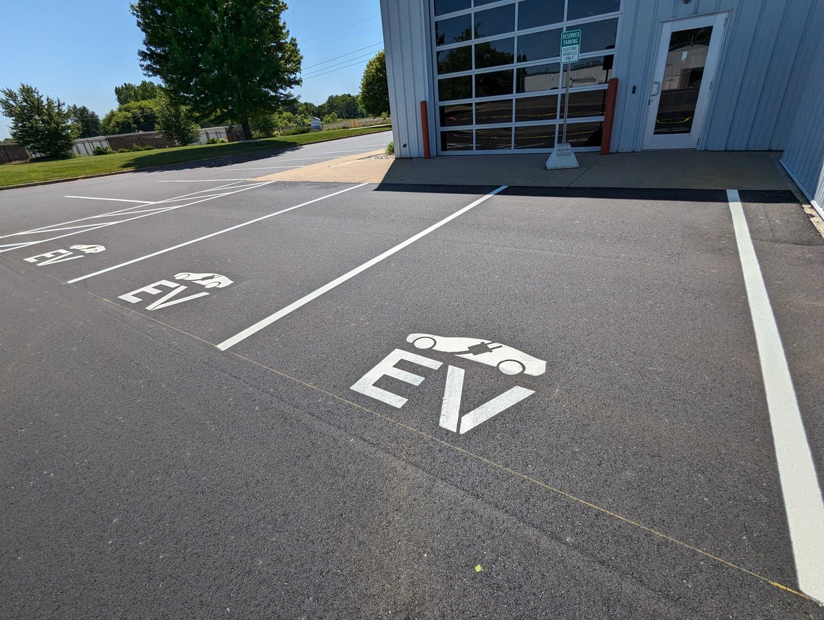 We recently revamped BizStream's parking lot! Not only can team members now glide into work on a smooth, pothole-free surface, but our electric vehicle drivers now have designated spots to charge up with our solar power energy. 🌞🔌

#EVCharging #SolarPower #BizStreamLife
