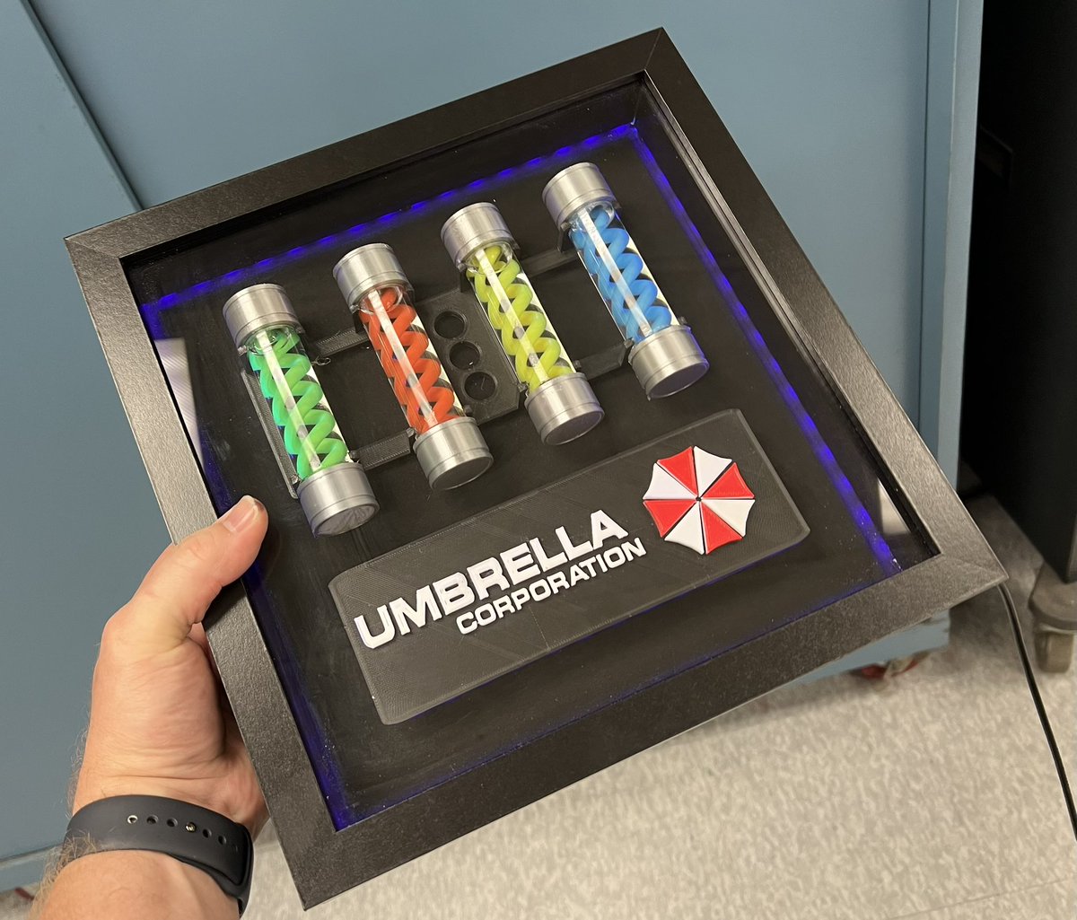 Aaron_Fez's tweet photo. 3D printers are fun. Made my own Resident Evil display.  Everything inside was printed and the frame &amp; LEDs came from Amazon.  #residentevil https://t.co/8DzREgVUtX