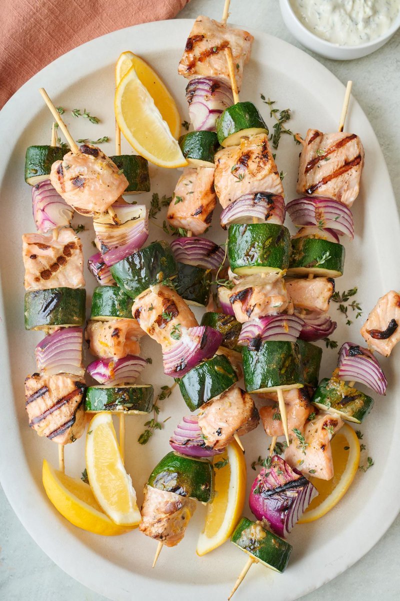 FeelGoodFoodie's tweet photo. These salmon kabobs are marinated in a tangy mustard sauce and grilled with zucchini and onions. Perfect over a flame for summer grilling! https://t.co/jy0bSY69CF https://t.co/9UMfFJYN7Y