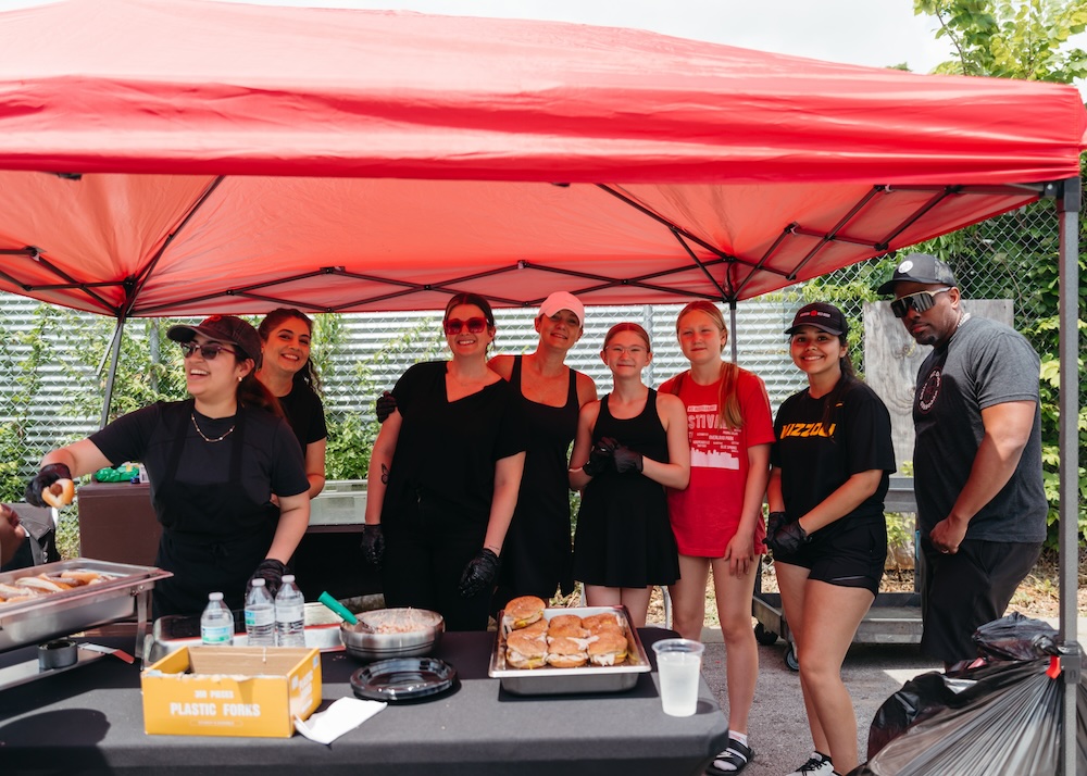 Last week, Red Door teamed up with <a href="/NourishKC/">NourishKC</a> for a community Block Party. Our team served some of our Woodfired Favorites to our community to kick off #HungerAwarenessMonth 🧡