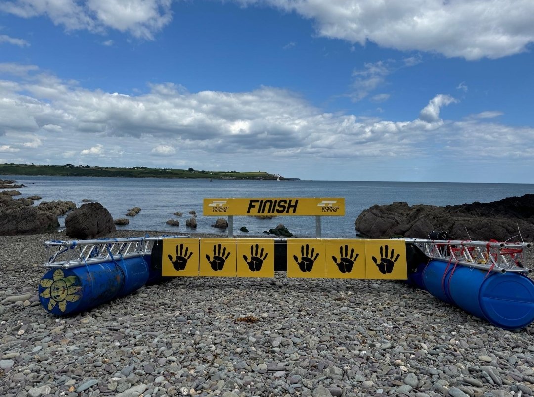 New finish for this year ready to go. Touch with the hand you've got your Chip on, then move through out of the path of following swimmers.