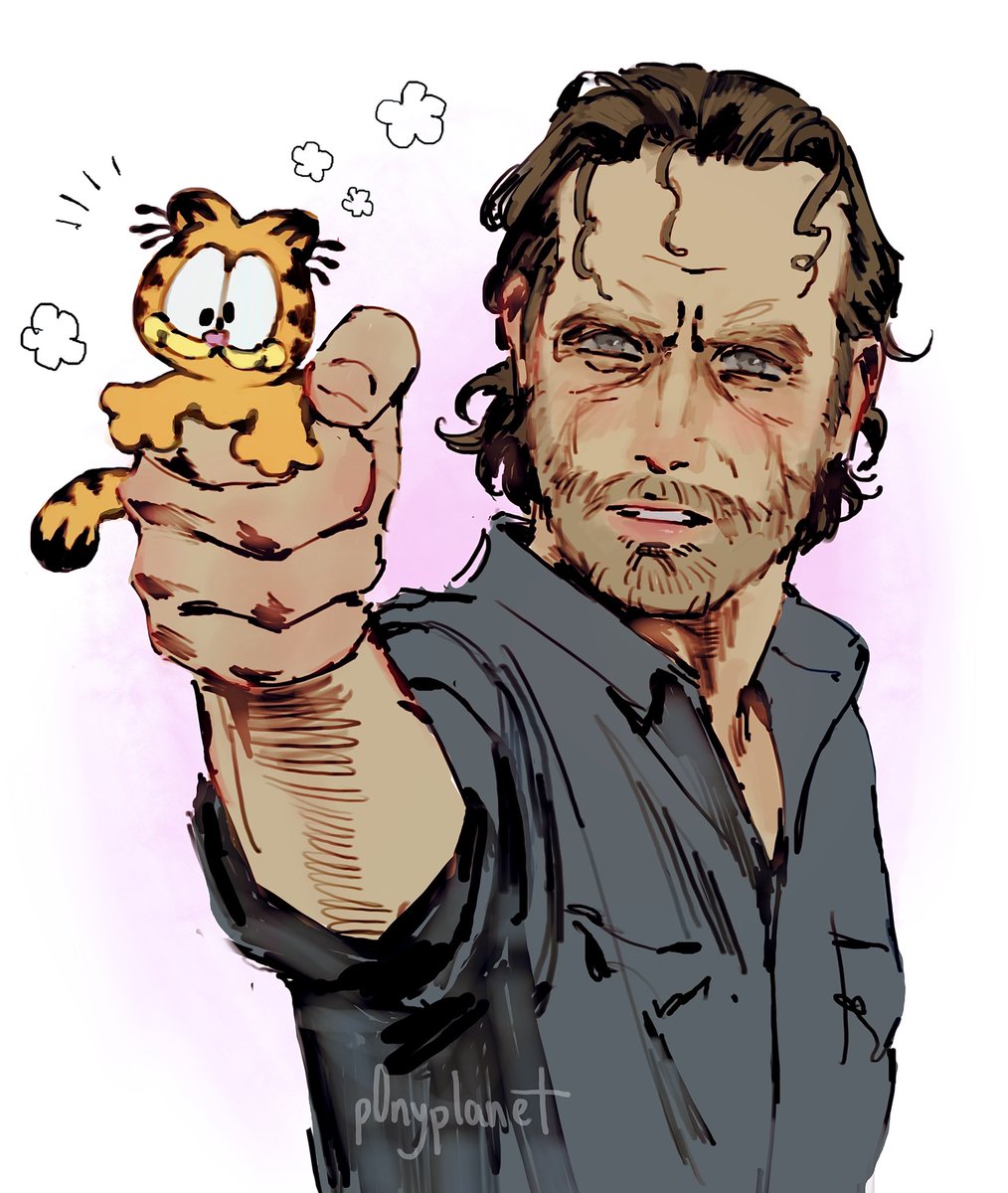 rick grimes holding garfield like his colt python