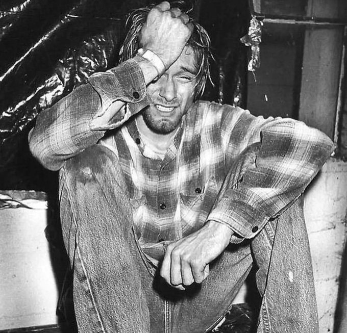 fasc1nate's tweet photo. "The photograph of Kurt Cobain in tears has been extensively published. Tilton watched Cobain smash his guitar through an amplifier and walk offstage. He followed him backstage.   

The pent-up emotion 'just had to go somewhere,' says Tilton, and Cobain burst into tears. 'What I really love about it is that it is a very real moment, and he allowed it. Other artists would have said, 'Not now, lan, please!' It is very unusual," adds Tilton, "for anyone from a band to show such vulnerability!"