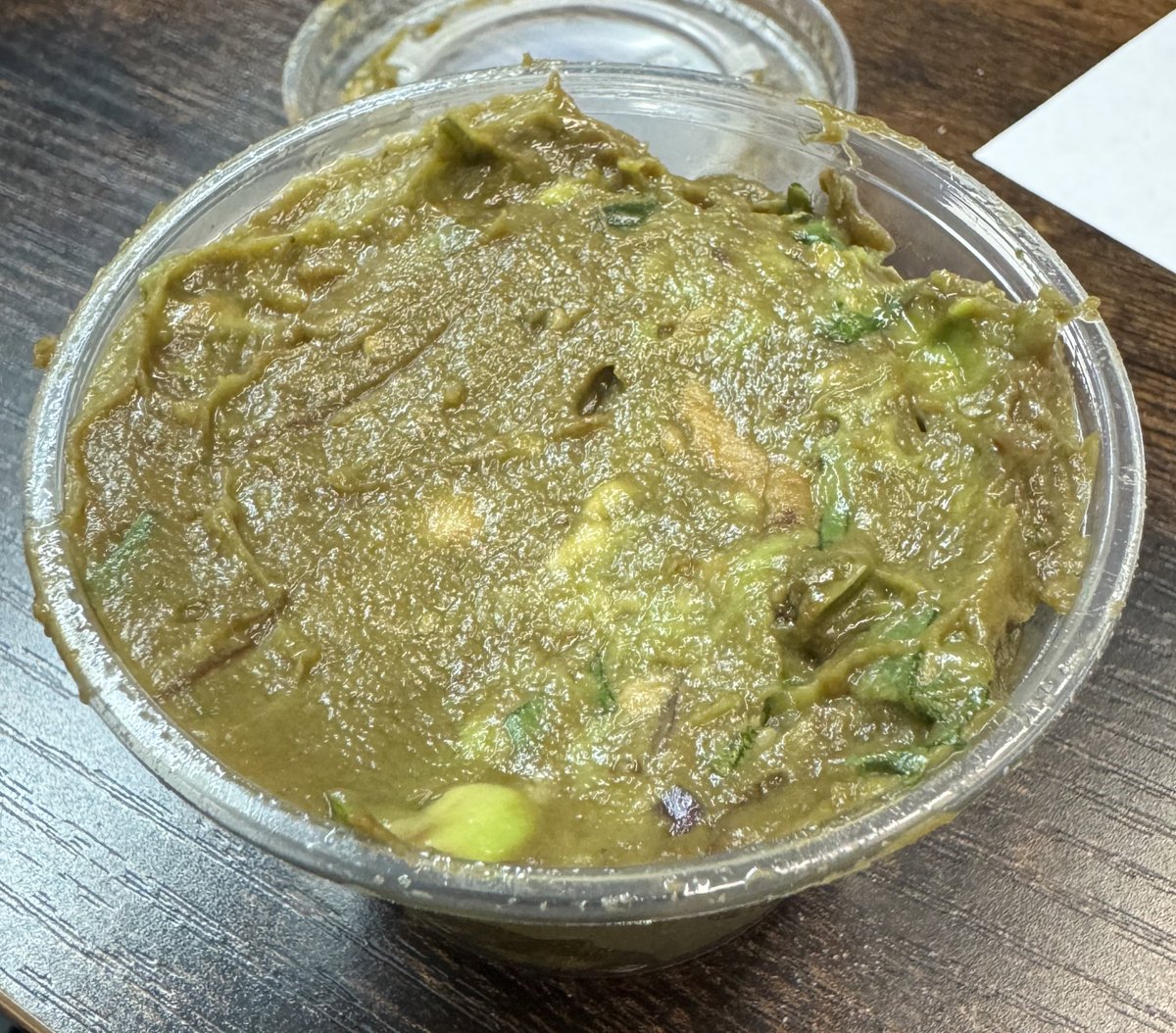 markdismore's tweet photo. Hey @ChipotleTweets can I get a refund on this brown goo that was supposed to be guac and chips? 🤮 https://t.co/jAfwDiKUHH