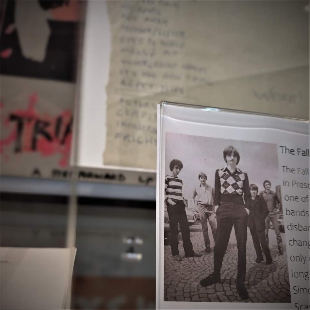 Our mini display of ‘Significant Local People’ now has a few items relating to Prestwich band The Fall.  There is a handwritten set list dated 25.11.78 from a gig they did at Prestwich Hospital and a little note in the corner of an upcoming John Peel Session! #thefall #markesmith