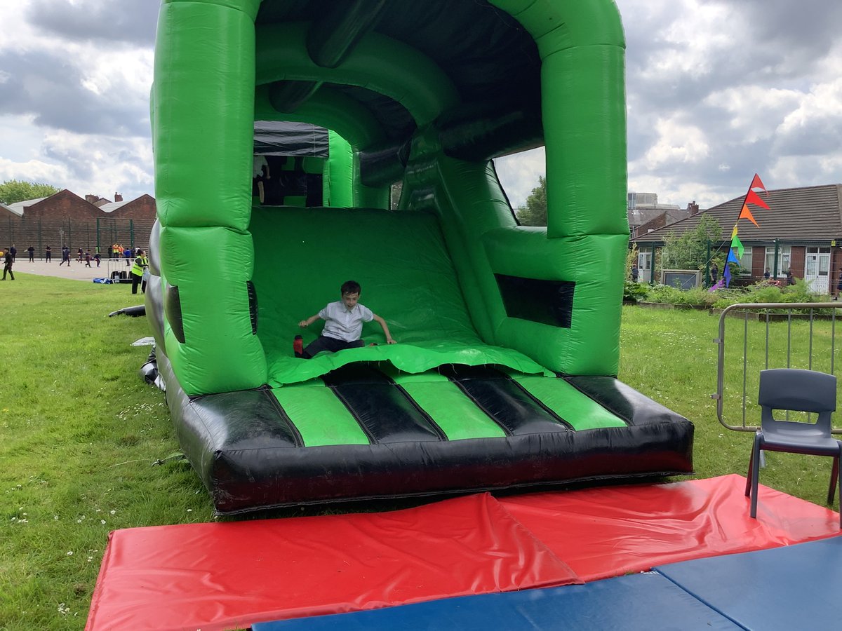 Year 6 celebrating the end of  SATS <a href="/St_Chrysostoms/">St Chrysostoms</a> The children got to enjoy Pizza, chips and ice creams, then have fun on the giant inflatable. #SATSREWAED #Welldone