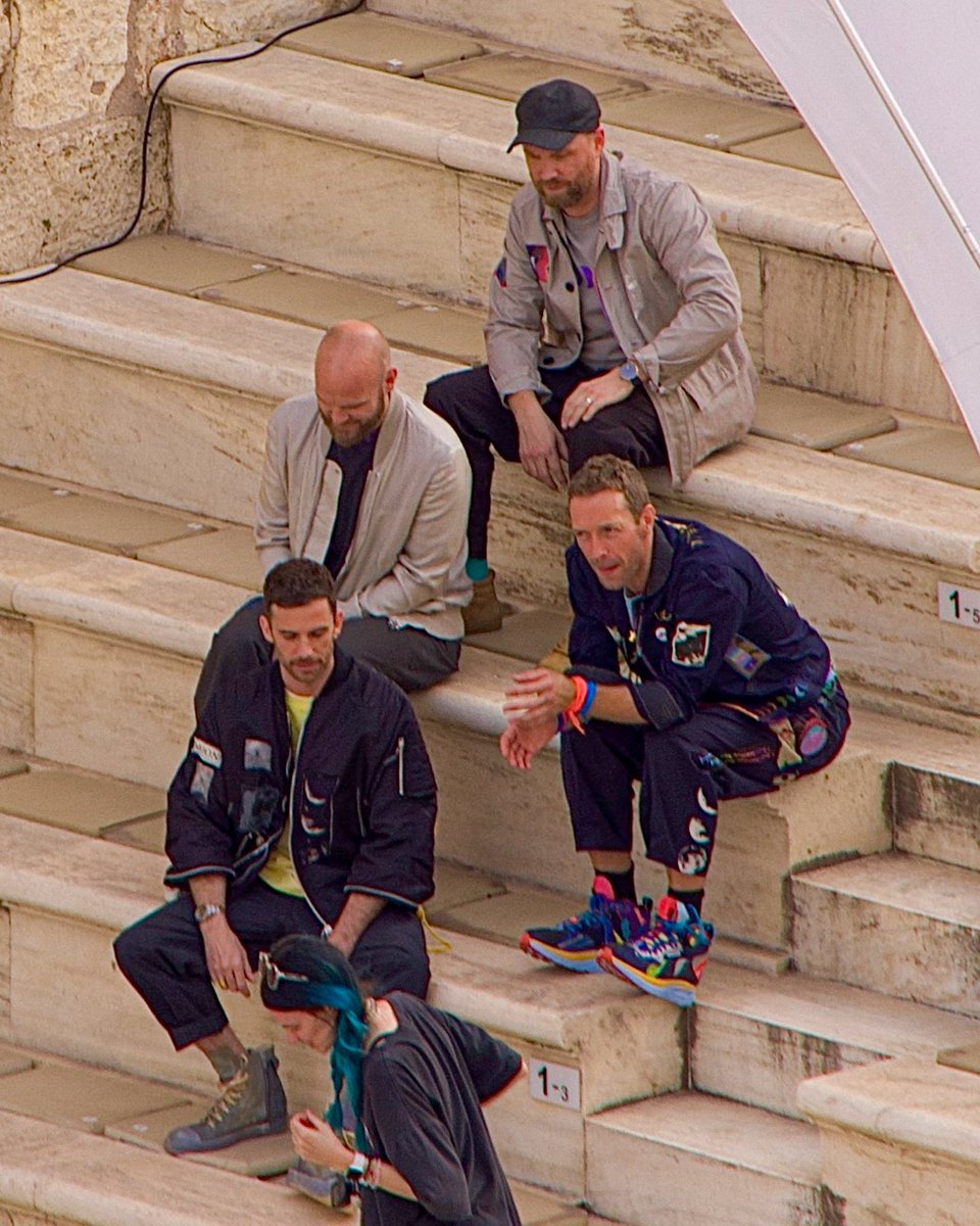 coldplayaccess's tweet photo. 🌙🌈🏛 Coldplay spotted with the new era outfits near the Acropolis, yesterday 

📸 Tamara Heck https://t.co/PVN4R6UNIV