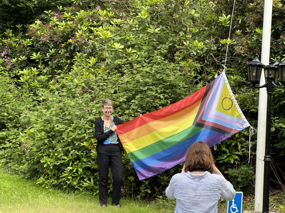 Lisa Ward raising the Pride flag at Northwest Ambulance HQ in Bolton. Great to share the moment. #nwas #pride #inclusion