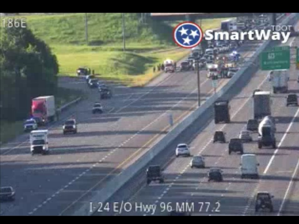 trafficbabe's tweet photo. #NASHtraffic - HEADS UP! Crash currently blocking ALL LANES on WB 24 at Old Fort Pkwy. Pickup rolled over into the grass to the right, another one up against the wall. https://t.co/cvUnmIACIs