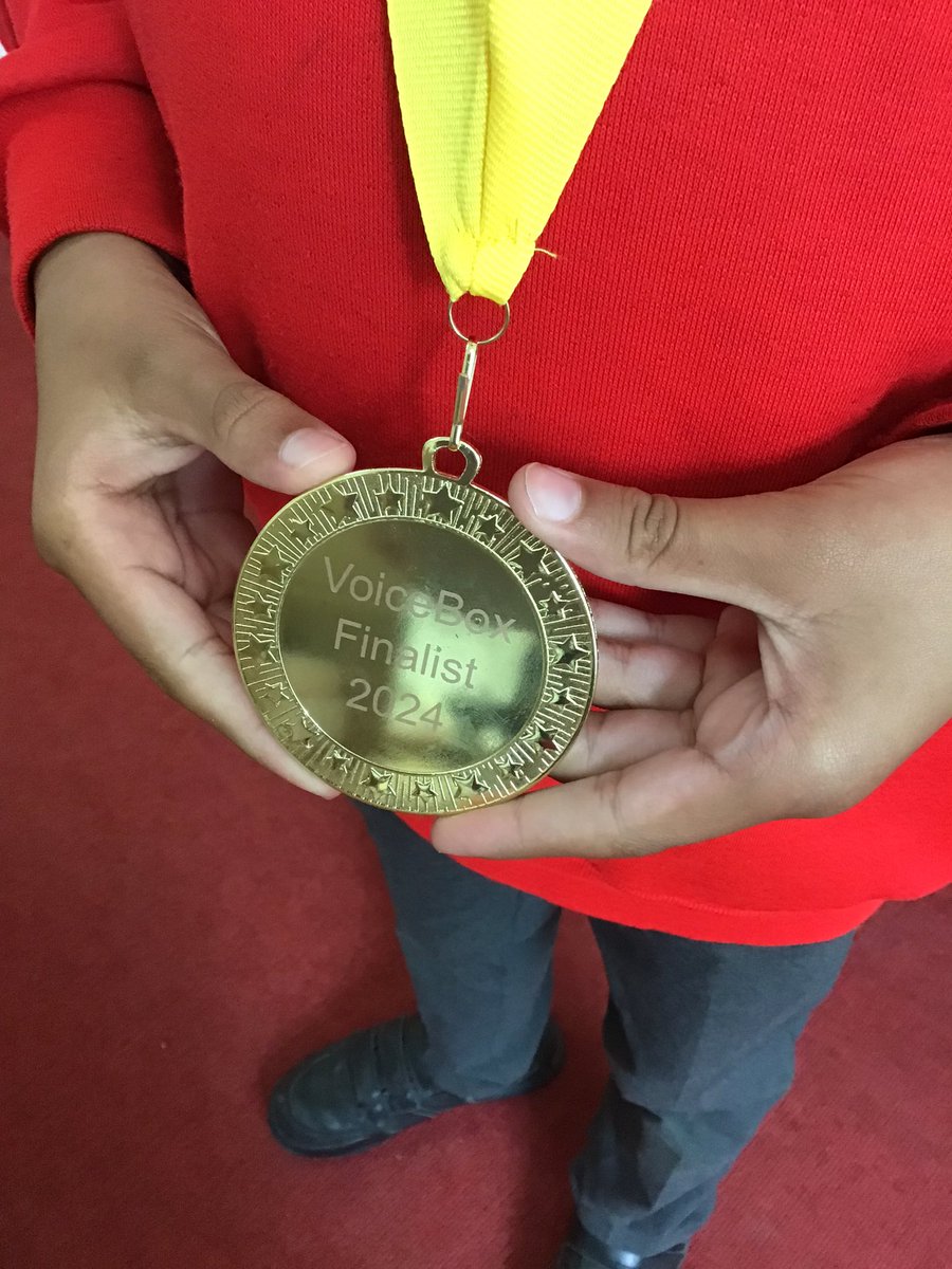 Congratulations to Isaac who was a finalist in the National Voicebox 2024 competition. Isaac attended the Scottish Parliament where he read out his joke. As a reward for getting to the final Isaac received a number of books for our school library and a medal.
