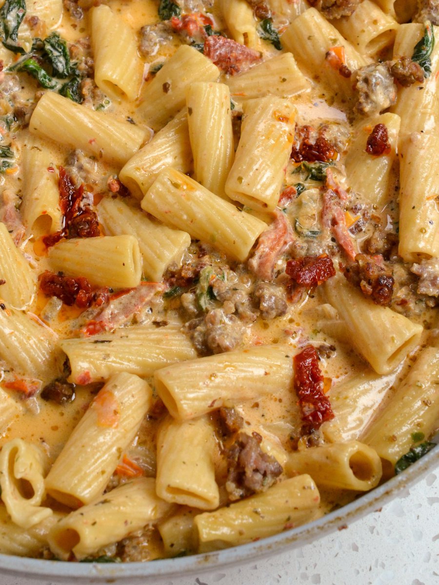 This scrumptious Italian Sausage Pasta combines rigatoni with sundried tomatoes and spinach in a creamy garlic Parmesan sauce. This easy pasta is truly one of our favorites and is always a hit with friends and family. justapinch.com/recipes/main-c…