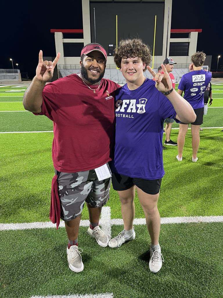 I had a great time at the SFA camp! Thank you to all the coaches that helped me out.
<a href="/coachmcase/">Michael Case</a> <a href="/CoachTyWarren/">Coach “Ty” Warren</a> <a href="/CoachTrice8/">Marcus Trice</a> <a href="/FBCoachLeonard/">Coach Cedric Leonard</a> <a href="/CoachMutz/">Coach Mike Mutz</a> <a href="/ChrisRossSFA/">Chris Ross</a> <a href="/ToddDodgeFBcamp/">Todd Dodge</a>
