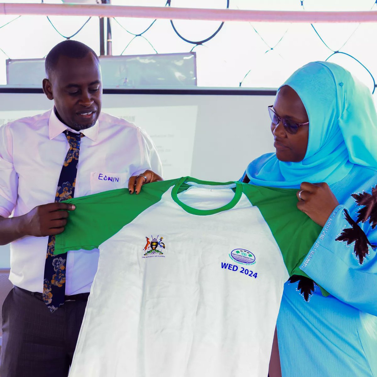 Holistic Actions for Development and Empowerment (@holisticactions) on Twitter photo <a href="/EdwinMuhumuzaB/">Edwin Muhumuza</a>, CEO of @YouthGoGreen, awards one of the dedicated participants with a shirt at the #ClimateChange Policy & Advocacy training! Celebrating commitment and passion for climate action. #YouthForClimate #ClimateAction <a href="/EdwinMuhumuzaB/">Edwin Muhumuza</a>, CEO of @YouthGoGreen, awards one of the dedicated participants with a shirt at the #ClimateChange Policy & Advocacy training! Celebrating commitment and passion for climate action. #YouthForClimate #ClimateAction