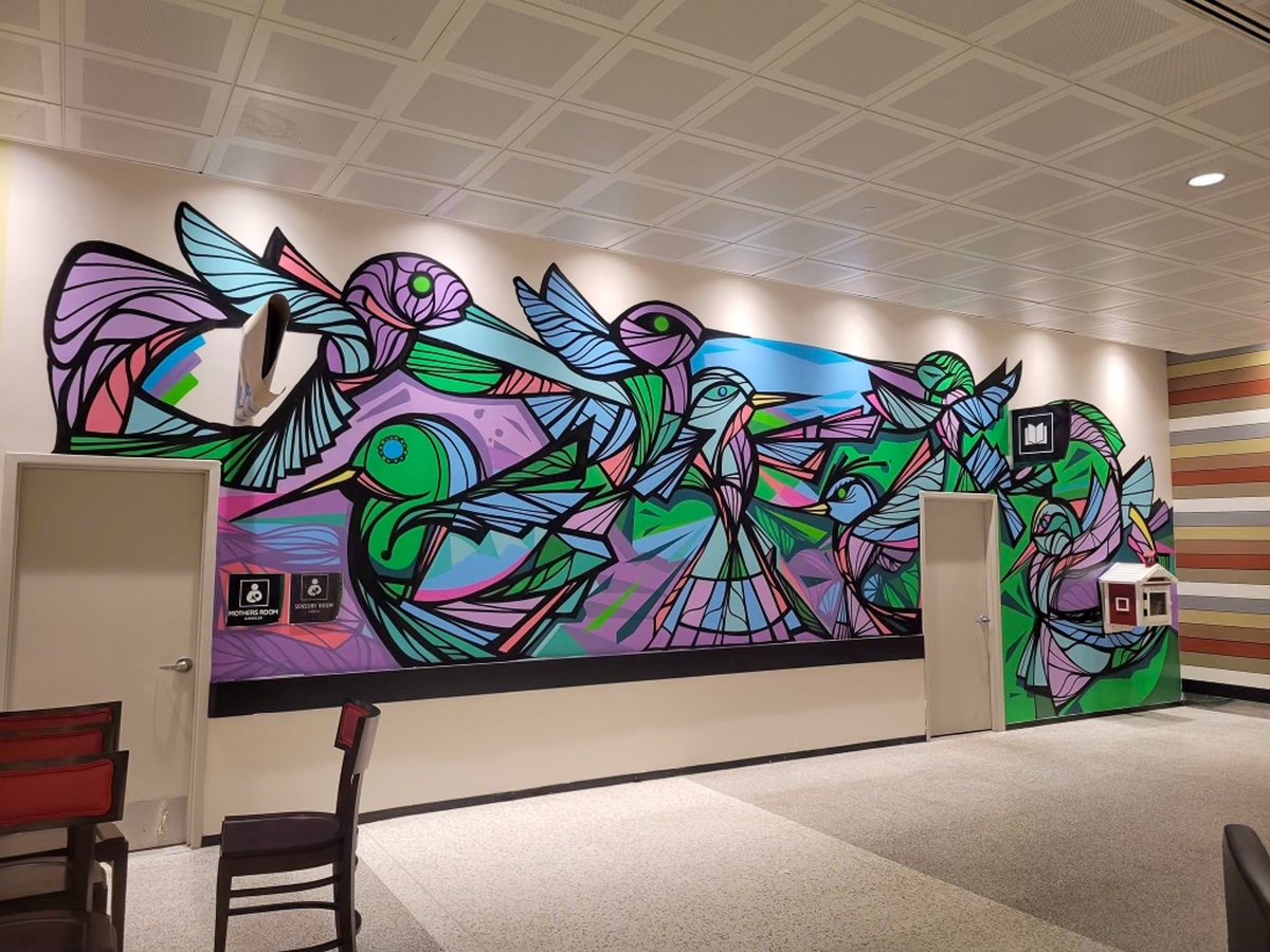 iah's tweet photo. Come see our new hummingbird family! Experience our new mural called "Family" by Houston artist Daniel Anguilu. 

📍Terminal A, near Gate A1

#HoustonAirportsArt https://t.co/YWzo6JQkr6