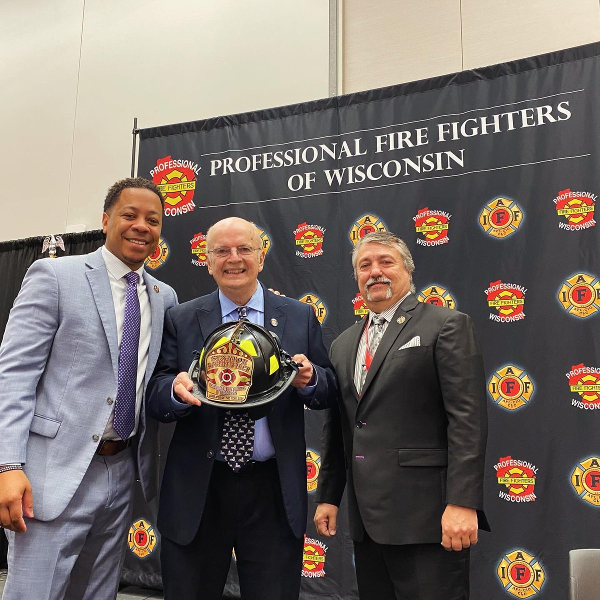 PFFW's tweet image. President Mitchell and Secretary/Treasurer Wilding presenting a helmet to Representative Tip McGuire and Senator Bob Wirch for having been named our Democratic Legislators of the Year. We are beyond grateful to you for championing our causes! Thank you and congratulations!