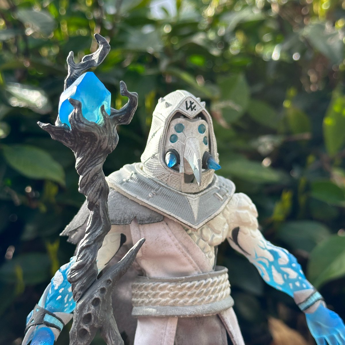 Arcturus showing off his translucent blue accents in the sunlight. His white and light grey coloring works so well against the contrasting intense blue. 

Did you know the design of his mask was inspired by a plague doctor’s mask from the 1600’s? 

You can preorder him in the