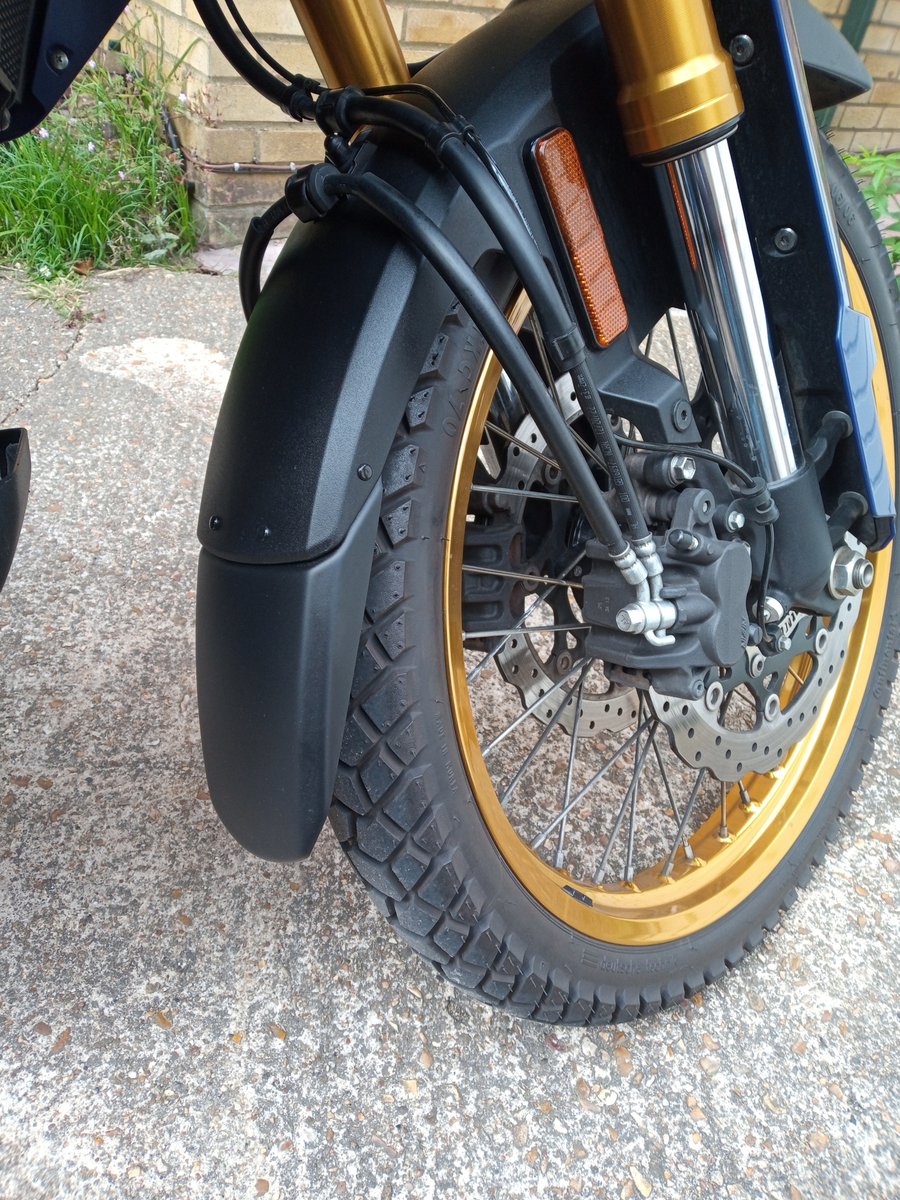Somehow the addition of a fender extender to the V-Strom <a href="/SuzukiBikesUK/">Suzuki Bikes UK</a>  gives solidity and peace of mind.  Comes from knowing that front of engine cleaning is halved.