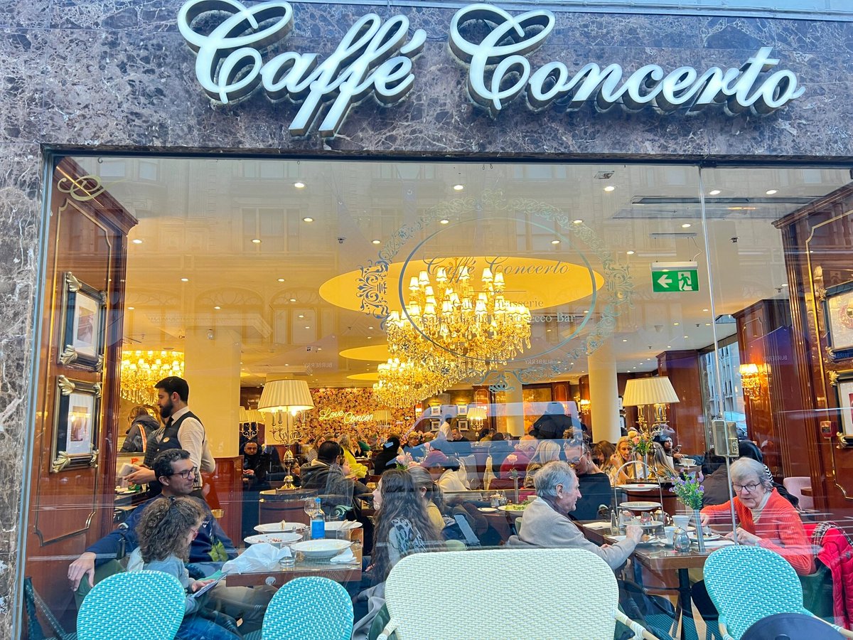 phulushe's tweet image. I went to Caffe Concerto and the coffee and scones were amazingly delicious.