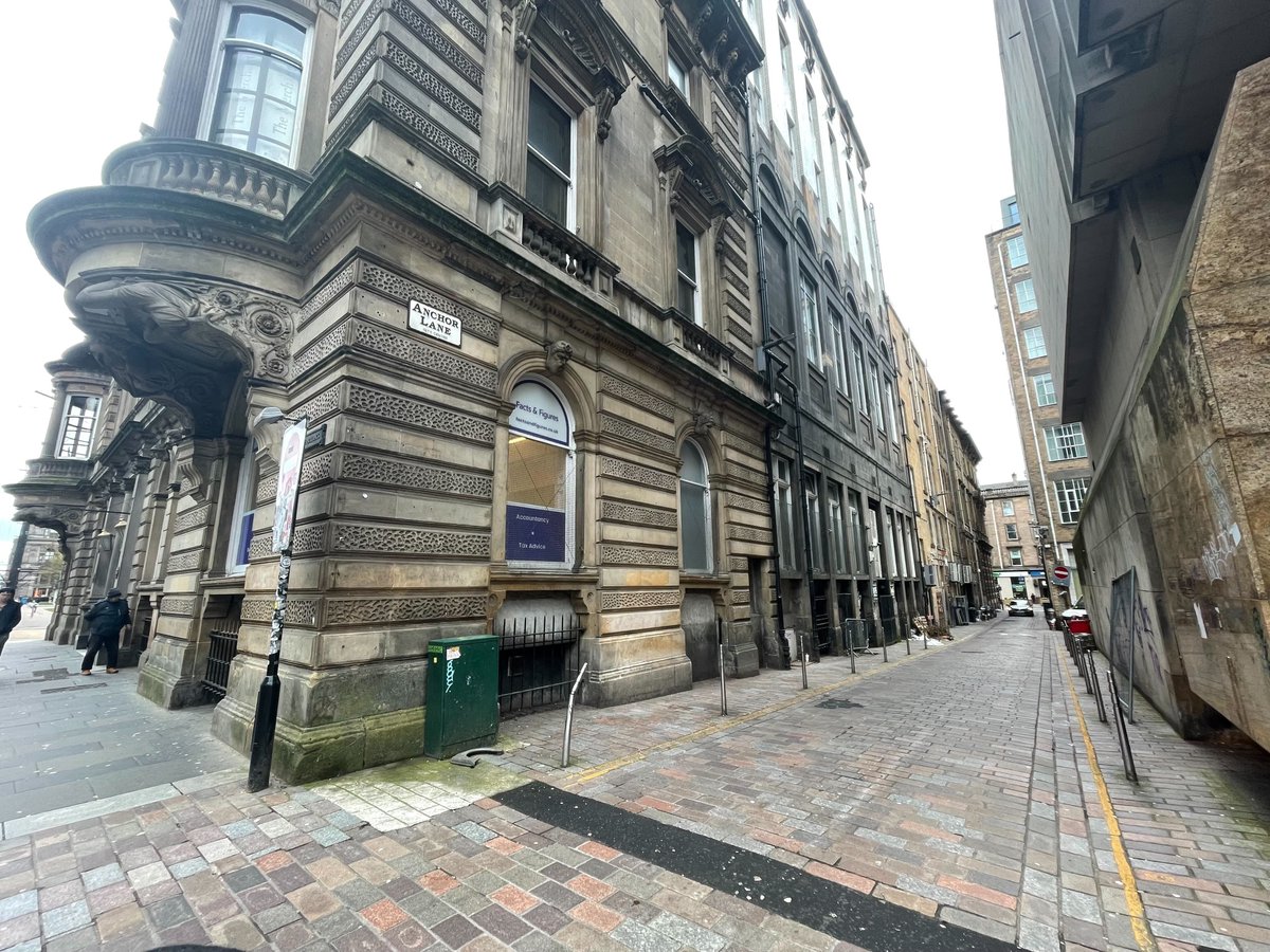 Merchants Moments: Anchor Lane runs along the western side of the Merchants House. Originally called St Vincent Lane, it was later renamed following the construction of the Anchor Line building at one end. Designed by James Miller, it is now home to <a href="/anchorlineglas/">The Anchor Line</a> restaurant.