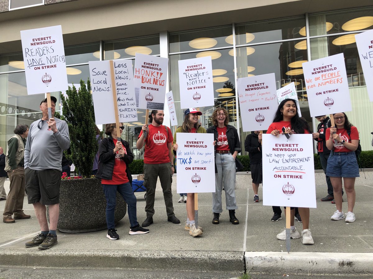 Caleb Hutton (@calebatsea) on Twitter photo Reporters <a href="/EverettHerald/">Everett Herald</a> on strike in downtown Everett.
Chanting: “Low wages, no pages!” Reporters <a href="/EverettHerald/">Everett Herald</a> on strike in downtown Everett.
Chanting: “Low wages, no pages!”