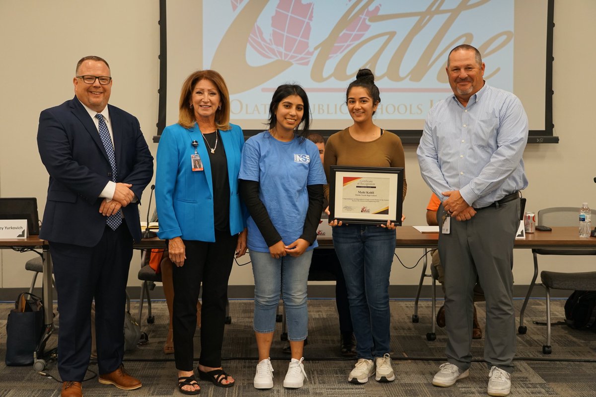 olatheschools's tweet photo. During the regular June Board of Education meeting, students from Olathe North High School and @OlatheEastHawks were honored for using the skills they learned in school to be successful in competitions, at the state level and in everyday life. We want to congratulate the following students:

🍎Olathe North's Kayden Freemon performed lifesaving actions with the skills she learned in our Sports Medicine & Exercise Science Academy to help a toddler who needed CPR in a roadside emergency.
🍎Mahi Kohli (right) of Olathe North was one of four Grand Award winners at the Greater Kansas City Science and Engineering Fair. Anshika Kapoor (left), also of Olathe North, received the MRIGlobal Excellence in Science Award at the Greater Kansas City Science and Engineering Fair.
🍎Madison Troup, a recent Olathe East High School graduate, earned first place in dramatic interpretation and program oral interpretation, and third in duo interpretation at the state 6A speech and drama championships.
🍎The Olathe North Science Bowl team won back-to-back regional championships and qualified for nationals!

#OPSForwardTogether