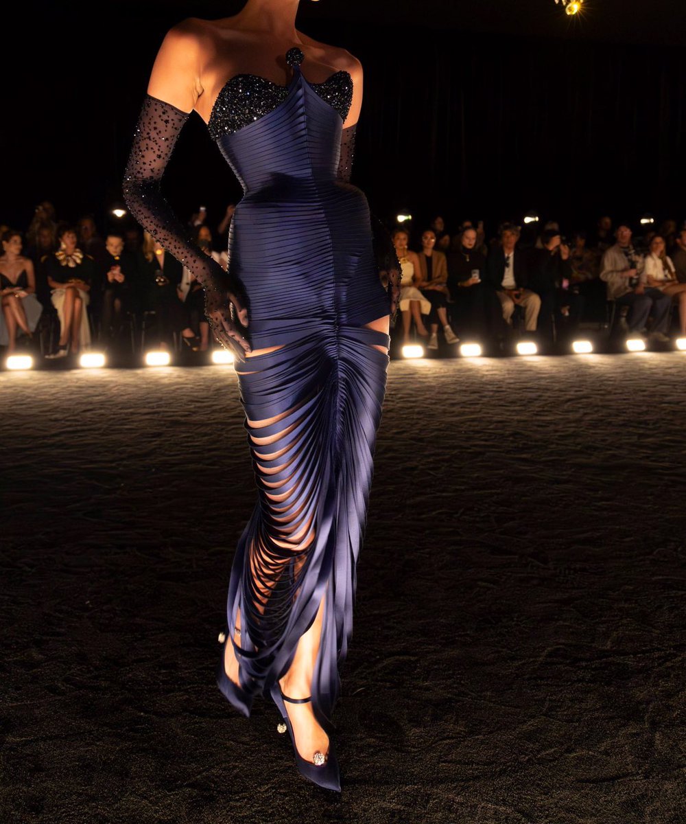 This Schiaparelli gown omg