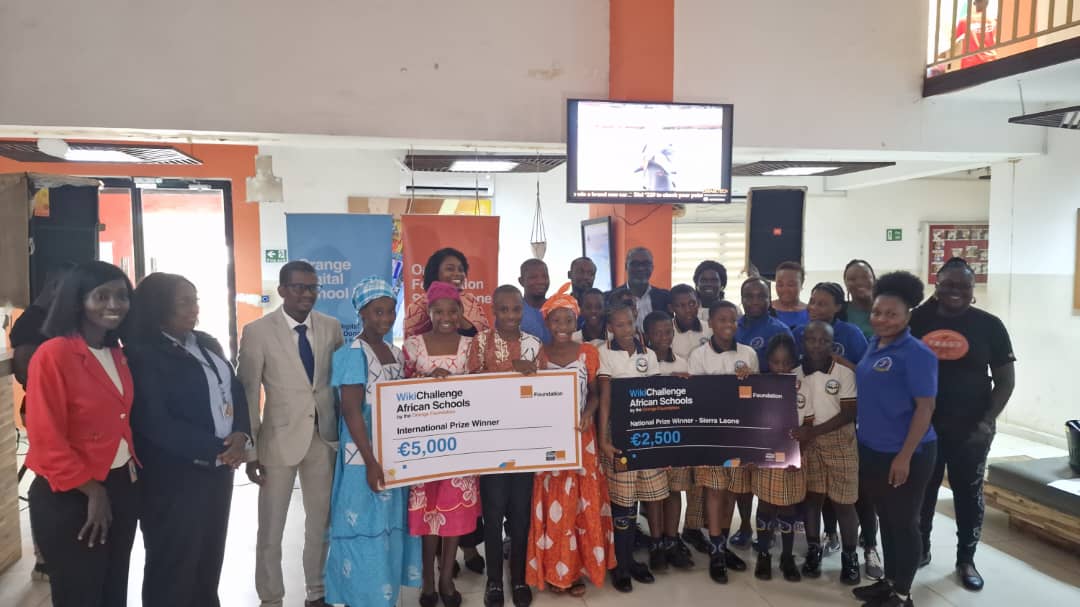 JayB11247's tweet photo. OSL stands proud and tall to celebrate with our WikiChallenge champions! Sierra Leone, the first English-speaking country to join and emerged victorious! Dele Prep won €5000 for their article on The Krio Print Dress, &amp; Kelmond Prep won €2500 wrote on Krio Marriage in SL!! https://t.co/GuHV3SULap