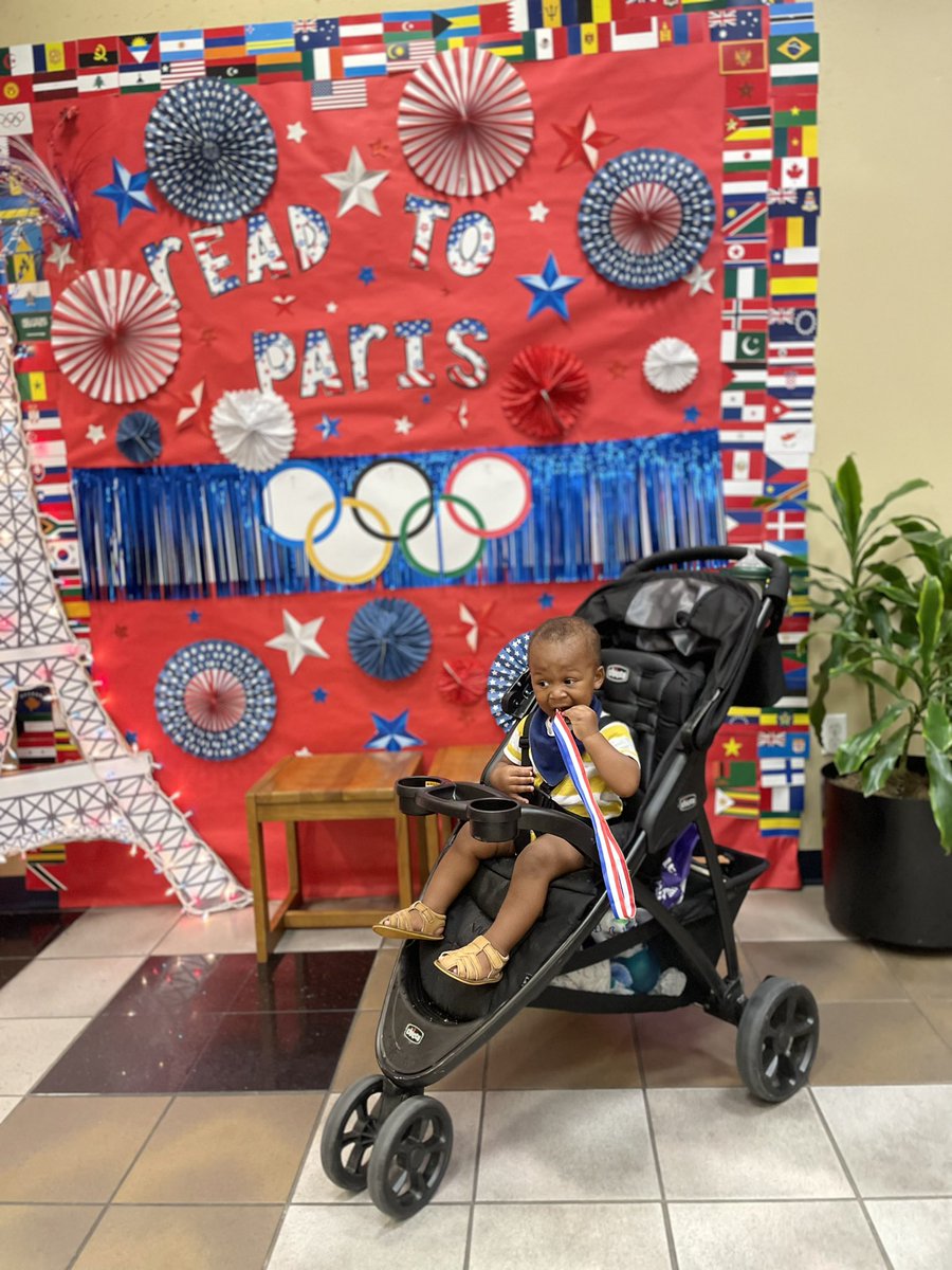 Runs4Ed's tweet image. Liam was just 2 months old when we first visited the library. Now he's running around and just earned his first "medal" for completing all his summer reading badges. Loving the "Read to Paris" theme! 📚✨ #literacy #libraryfun Thank you for teaching & bringing me! @lfinney808🥰😘