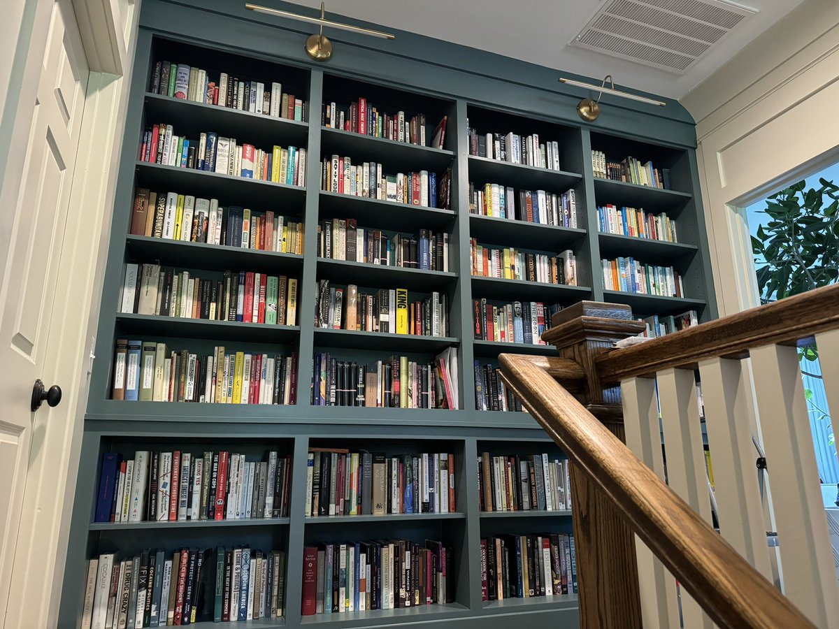 joeljmiller's tweet photo. We recently renovated and built in this new bookcase at the top of the stairs. I got to fill it up yesterday. https://t.co/UQP7q54evC