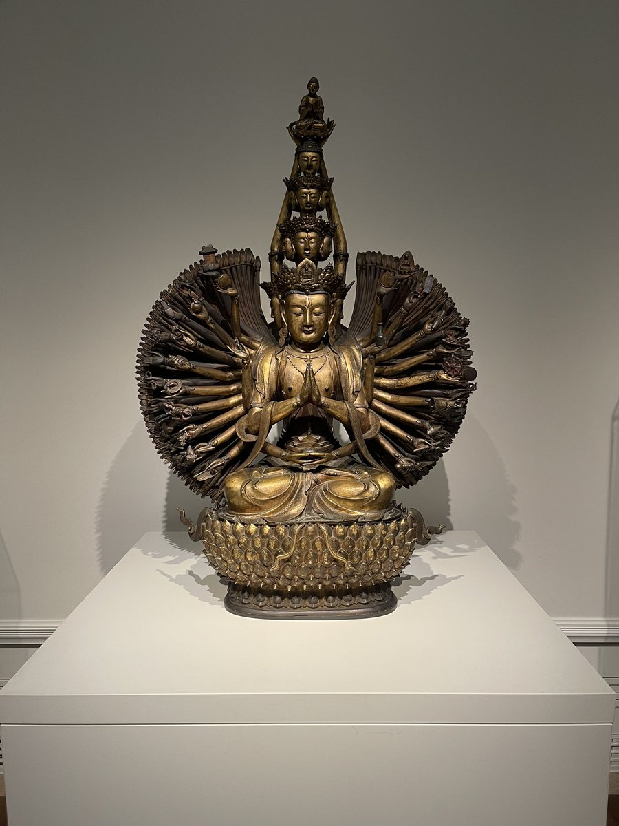 PersevereOnward's tweet photo. When I went to the Seattle Art Museum and saw the 'Thousand-armed, eleven-headed Guanyin' for the first time I was really drawn to this piece and was intrigued.

Widely known to be the goddess of compassion and mercy. I was reading different descriptions and stories about this deity. Guanyin is also a Chinese name for Avalokitesvara so some websites associate her with either name.

It is said that the Thousand armed, eyed and eleven-headed Guanyin was transformed from Avalokitesvara who made a vow (to never to rest until he had freed all sentient beings from saṃsāra) but despite the efforts of saving infinite sentient beings it was not increasing or decreasing, and so she slowly decreased her efforts and broke her vow.

And as a result she split into ten pieces and her body shattered. Her root guru Amitabha used his powers and transformed her into Thousand armed, eyed and eleven-headed Guanyin.

She has 11 faces: 3 bodhisattvas (one who seeks awakening), 3 faces of wrathful, 3 faces of both the bodhisattva and ghost, 1 rear face of fierce, cruel, and laughing, and 1 top face of buddha.

She observes with her thousand eyes and protects with her thousand arms. The multiple arms and head signify her infinite powers and immeasurable reach. Which means she is equipped with infinite strength and dharma power and has countless methods for saving sentient beings. She is able to perform calamity eradication, subjugation, enrichment, magnetization, and wisdom enhancement.

Some believe that when one of their adherents departs from this world, they are placed by Guanyin in the heart of a lotus and then sent to the Western Pure Land of Ultimate Bliss.

---

Reading all this and seeing how the statues and pictures are designed, it made me think of the C.S. Joseph lecture clips of Ne (Extroverted intuition; Water) and Si (Introverted Sensing; Earth). People with these cognitive functions have the ability of prescience because of the 'single point of origin with unlimited possibilities'.

🌊 + 🌎  = 🪷🪷🪷