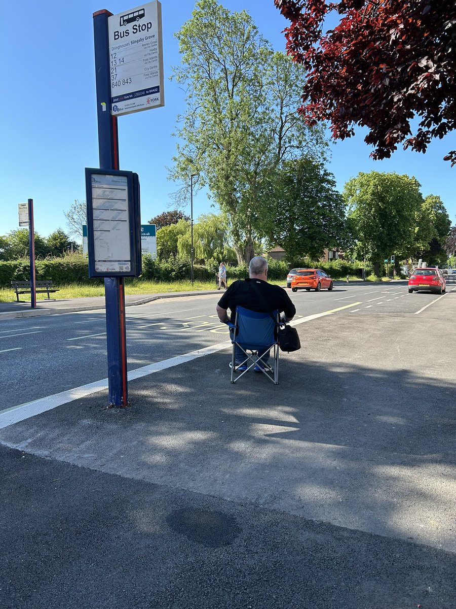 flickhwilliams's tweet photo. This disabled man has given up waiting for @CityofYork to spend  its BSIP money providing seating /shelter at bus stops. He told me he can walk but cannot stand &amp; his wife (out of shot) carries the chair which is the only way they can take the bus. 
#DisabledByTheBusNetwork https://t.co/VhFcs28D5b