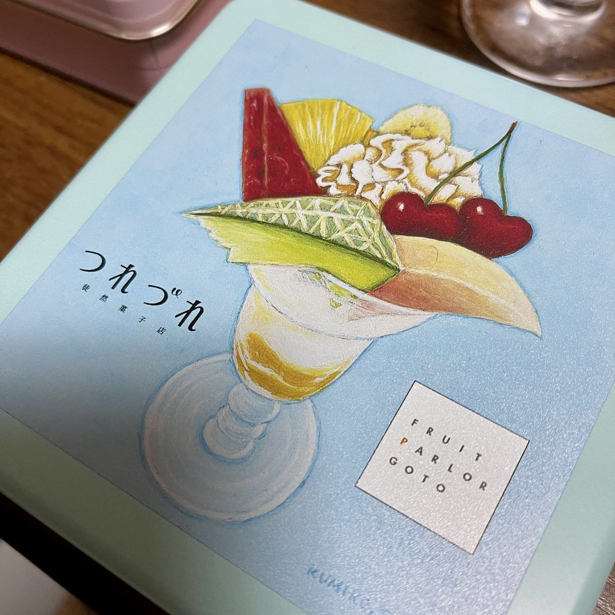 pchie's tweet image. 浅草の『フルーツパーラーゴトウ』さんへ行って来ました♪3月から発売されているクッキー缶（画家の樋上公実子さまのイラスト缶）を買いに〜♡パフェは『9種の果実の初夏色のパフェ』を頂きまシター☆スイカのアイスも入っててゴージャスのデリシャスで大満足デス！