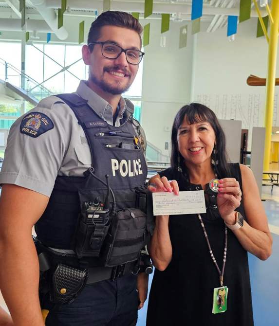 RCMPNB's tweet photo. #RCMPNB member Cst. Lecours developed a challenge coin to sell in order to raise funds for the #Elsipogtog School and the local youth centre. The coin represents the ongoing partnership between #Elsipogtog First Nation and the #RCMP. He was able to raise $2,400, well done! https://t.co/Rp9gFQUQVc