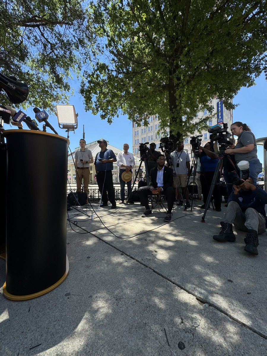 pov at the podium advocating for disability equity regarding the five points station closure 📣