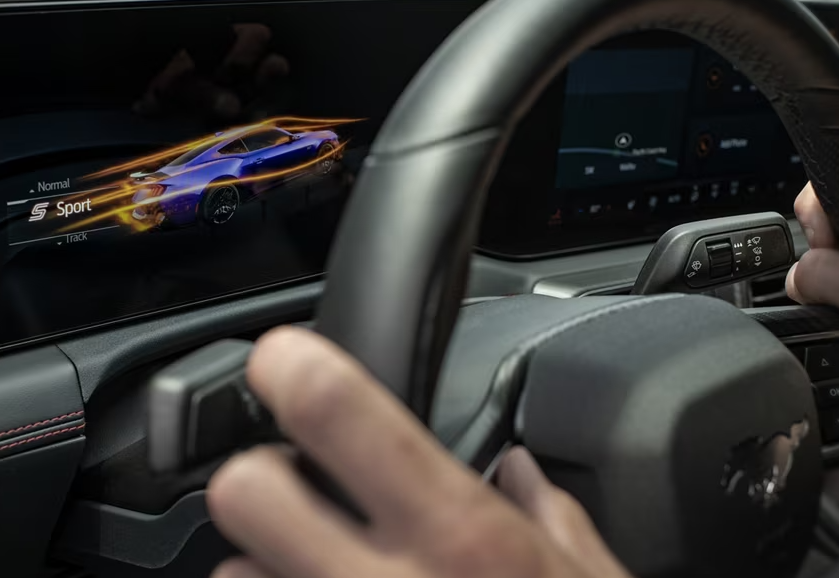 Step into the future with the classy Mustang. Its driver-centric cockpit is engineered for seamless interaction and an enriched driving experience.