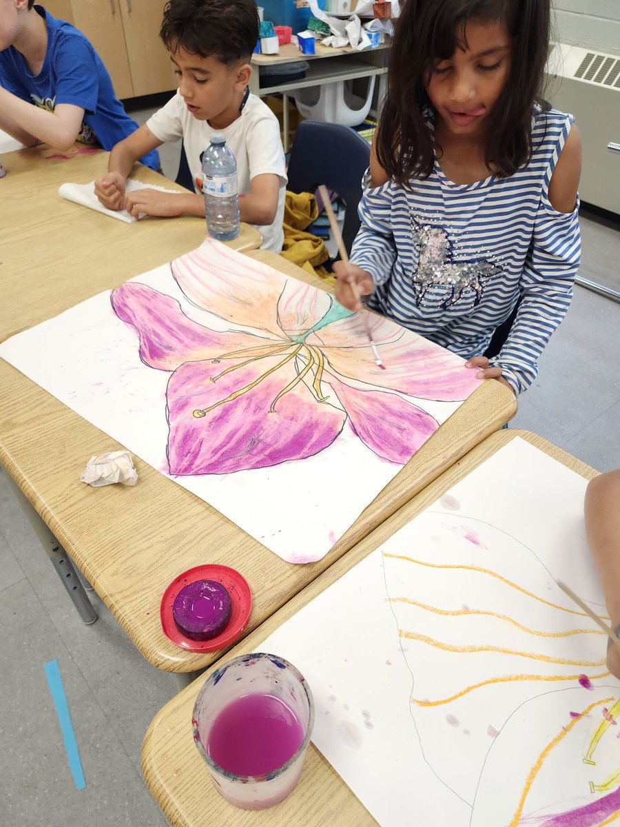 Finished up our Georgia o'keefe inspired flowers.  We're going to finish them off by labeling the parts of the flower tomorrow!  They turned out beautiful!  <a href="/GlenwoodGriffin/">Glenwood Griffins</a> <a href="/ibyp/">Iris</a>