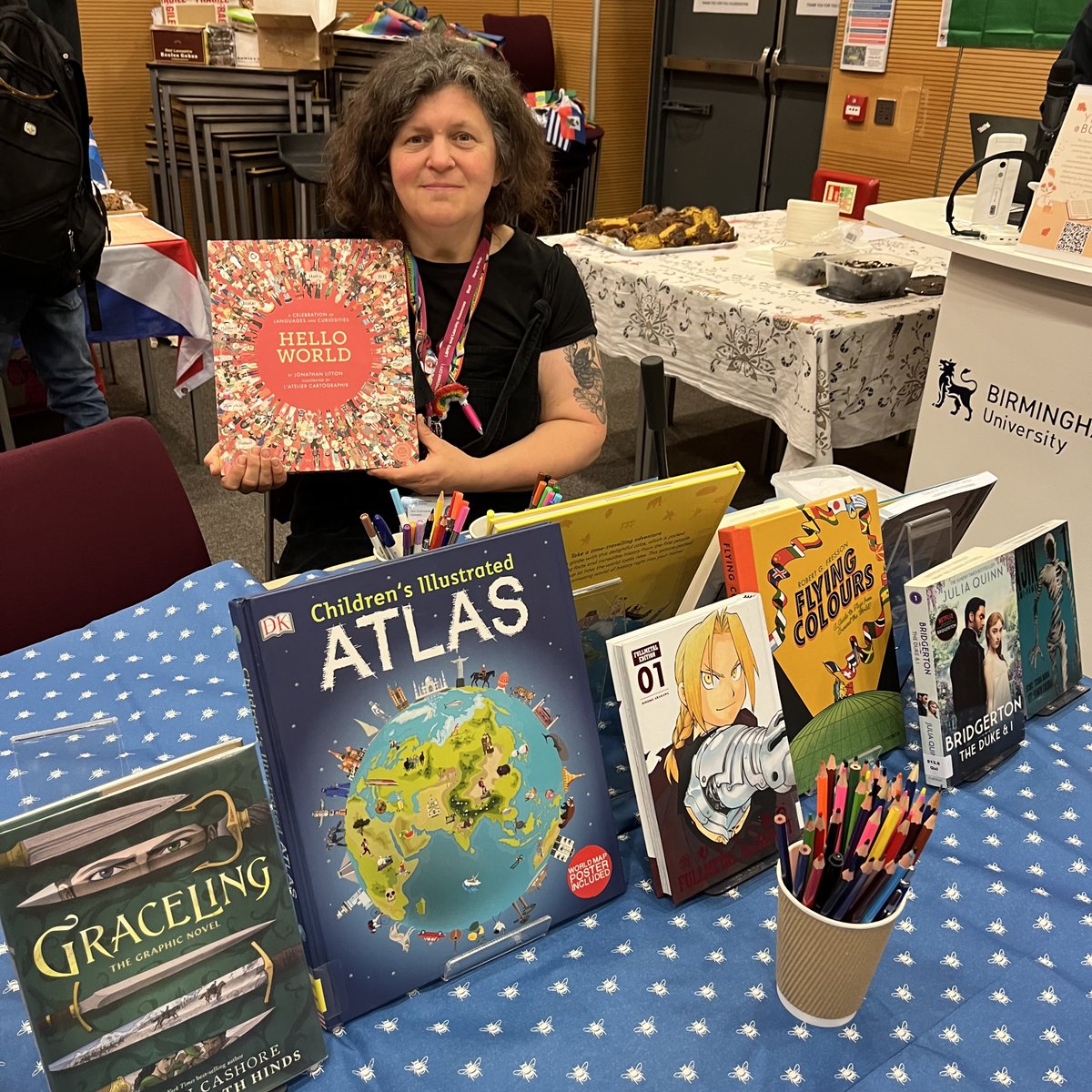 BCU Library &amp; Learning Resources have got a stall at the HELS International Day! 🌍
Come and say hello to our lovely librarian Ann for badge making and a chance to explore some of our wonderful books. 
📍Room 046 at City South from now until 3pm. 
#YourBCULibrary <a href="/BCUHELS/">BCU HELS</a>