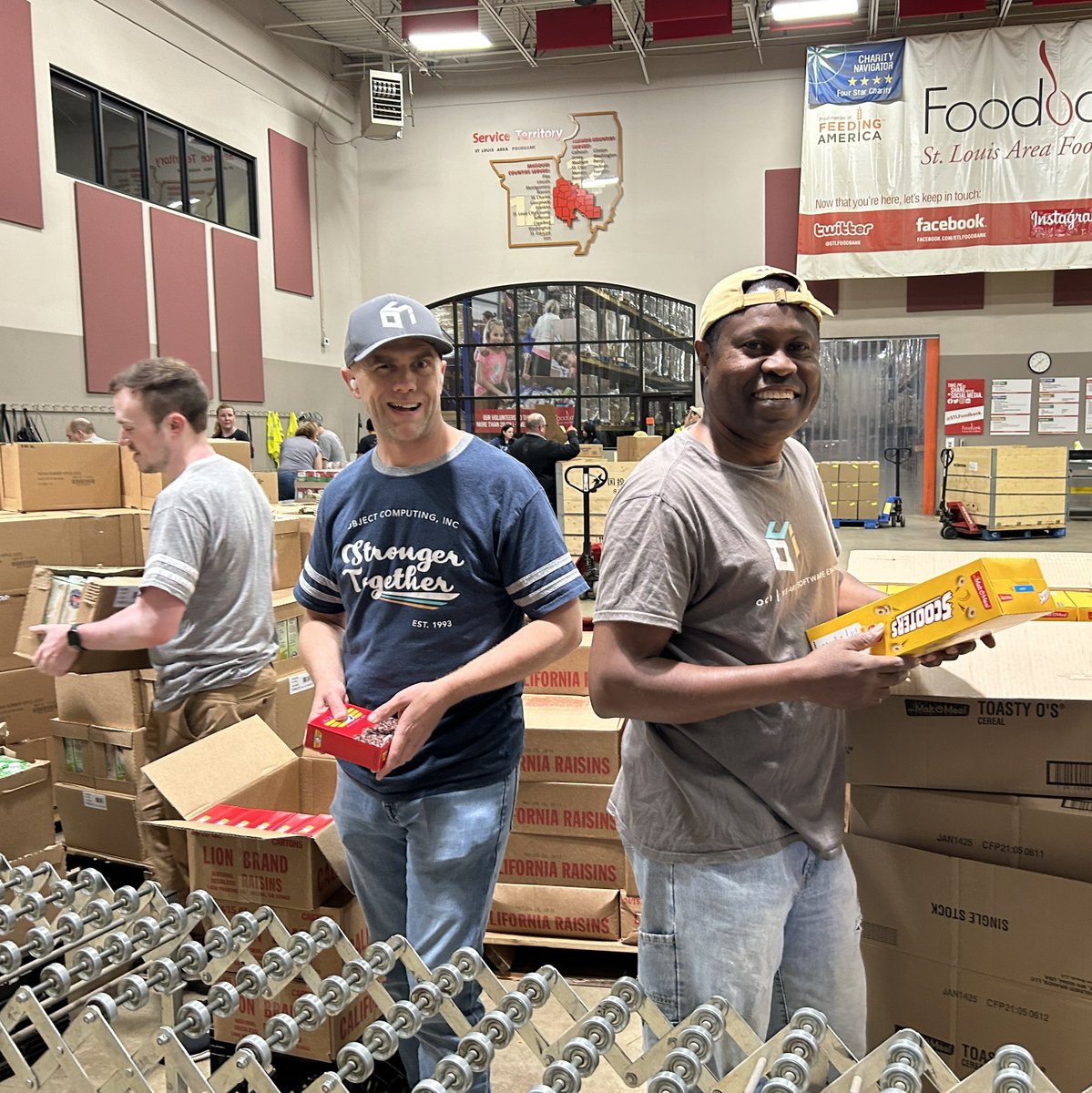 ObjectComputing's tweet image. Our team had the honor of volunteering at the St. Louis Area Foodbank distribution center. Together, they repackaged 7 tons of food, helping provide 11,944 meals for community members experiencing food insecurity. #ShareItBack #foodinsecurity #volunteerism