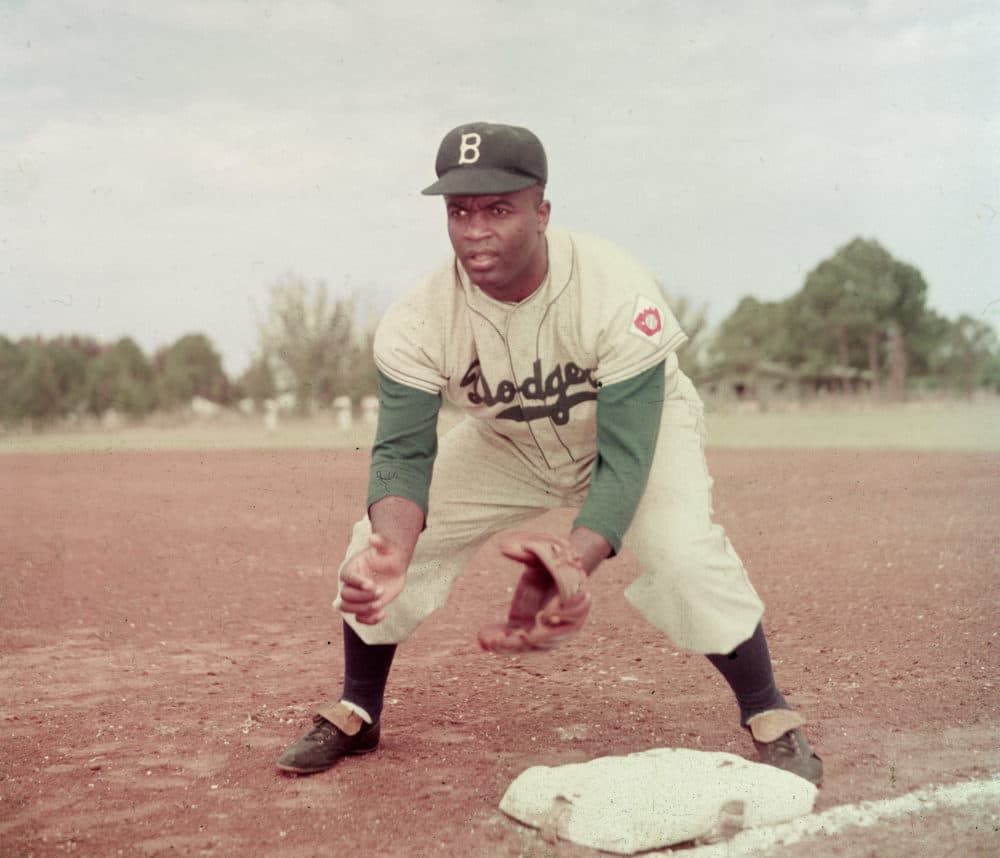 "I cannot stand and sing the anthem. I cannot salute the flag; I know that I am a black man in a white world."

Jackie Robinson